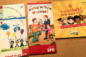 Im Bild sind die 3 Versionen des Kinderstadtplans im Überblick dargestellt.